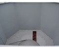 Wewnętrzny widok podajnika ślimakowego kotła Biowarmer 150 kW.