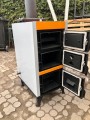 Piec CO na paliwa stałe Ultima 8 kW z 200-litrowym buforem. Widok boczny, otwarte drzwiczki.