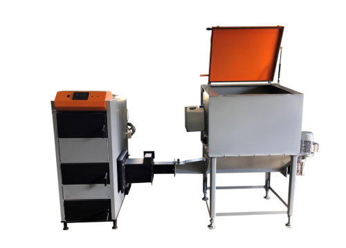 Kocioł c.o. Biowarmer 38 kW standard - widok z przodu urządzenia z otwartym zasobnikiem pelletu.