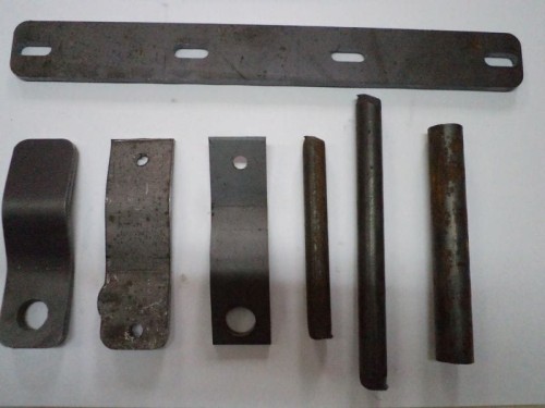 Mechanizm rusztu ruchomego (Logica 20-27) - elementy metalowe: płytki, pręty.